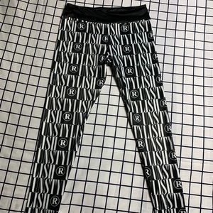 UNSTYLISH brand all over print leggings